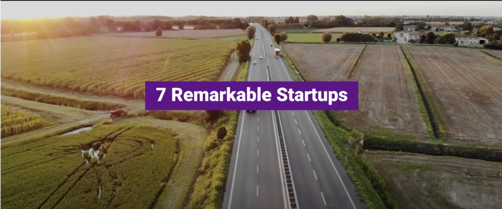 Country Road landscape at sunset with a highway in the centre of the image and a purple bold title '7 Remarkable Startups'